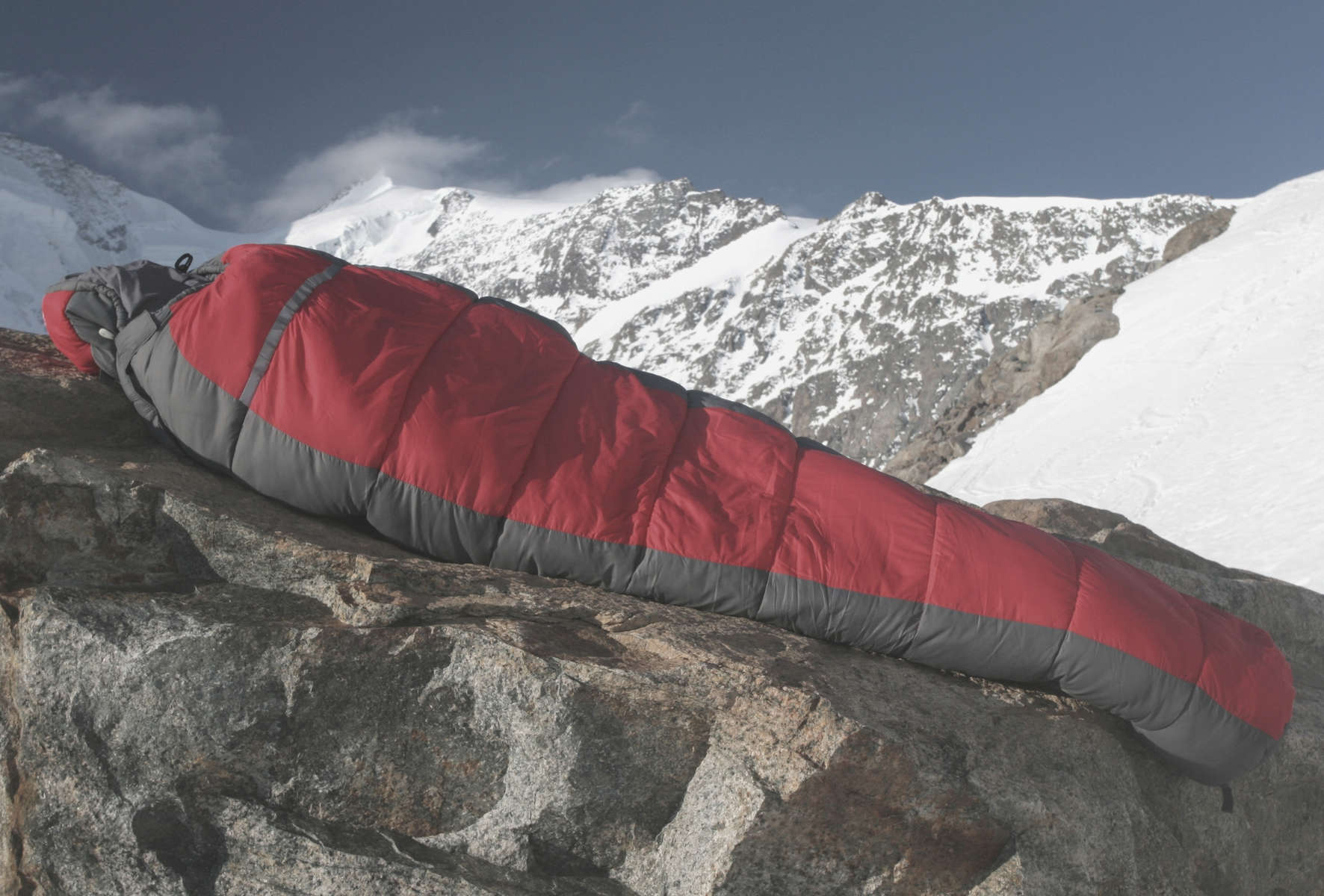 Sleeping Bag on rock in mountains